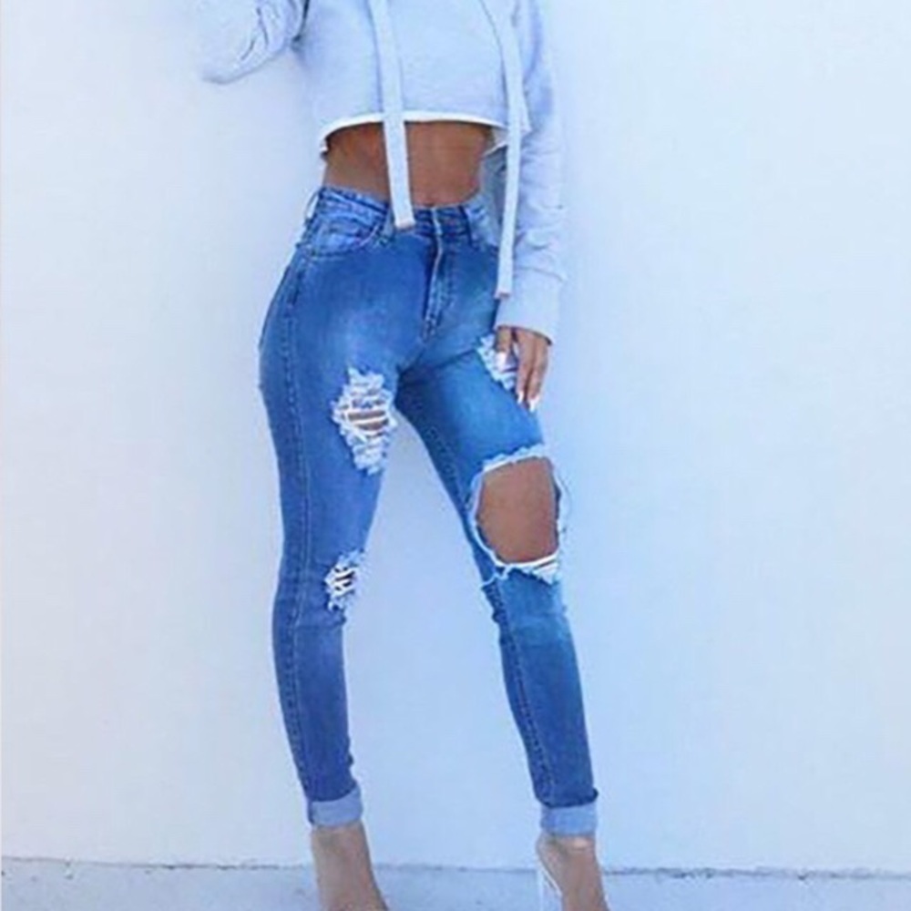 Fashion Nova high waisted distressed jeans